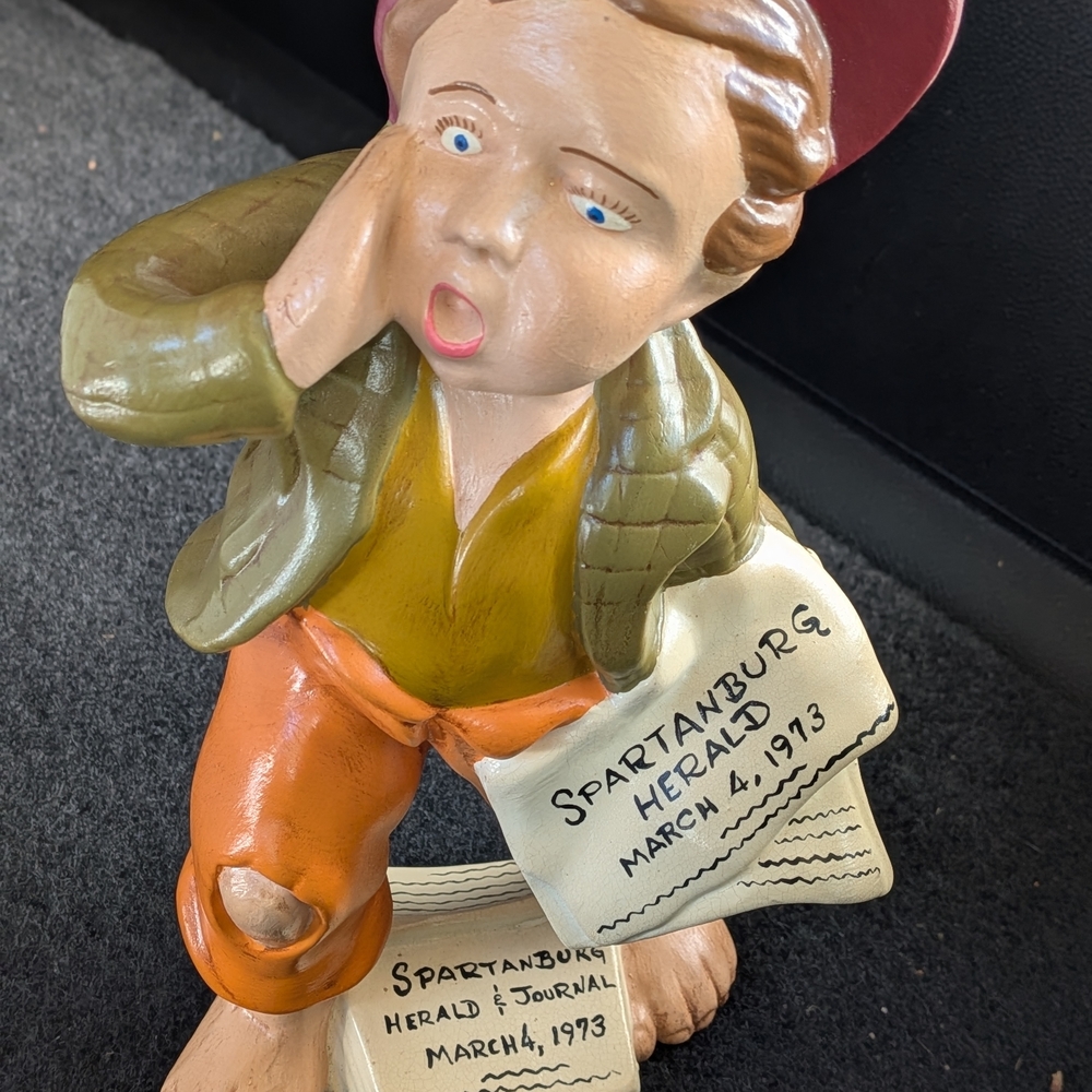 Vintage Newsboy Figurine with Newspaper